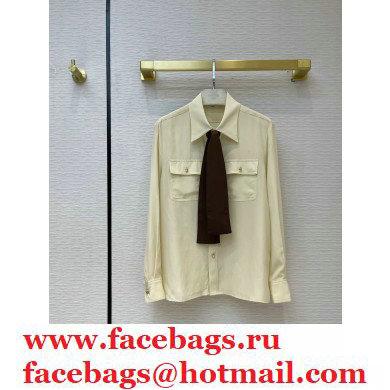 celine off white silk shirt with black tie 2021