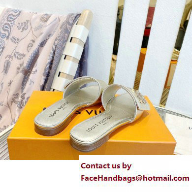 Louis Vuitton Shake Flat Mules in Metallic lambskin Gold 2023