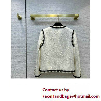 CHANEL white tweed jacket with black border 2023