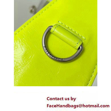 Balenciaga Superbusy XS Sling Bag in Arena calfskin neon yellow 2023