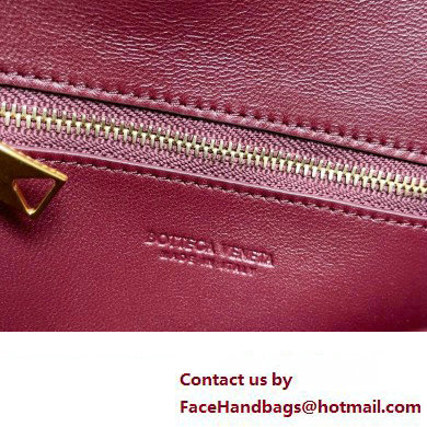 Bottega Veneta Mini Andiamo Cross-Body Intrecciato leather bag BAROLO with metallic knot closure 2024