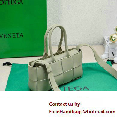 Bottega Veneta Mini East-West Arco Tote Intreccio leather bag with detachable strap TRAVERTINE 2024