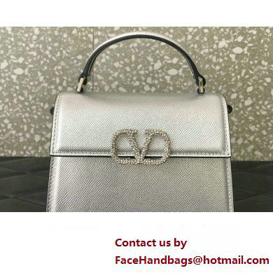 Valentino Mini VSLING Handbag in metallic Silver grainy calfskin with VLogo Signature crystals 2024