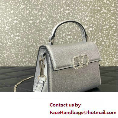 Valentino Mini VSLING Handbag in metallic Silver grainy calfskin with VLogo Signature crystals 2024