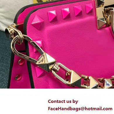 Valentino Rockstud Clutch Bag In Calfskin Fuchsia 2024