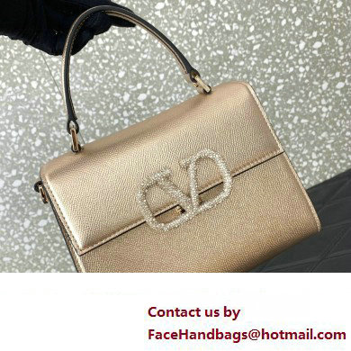 Valentino small VSLING Handbag in metallic Gold grainy calfskin with VLogo Signature crystals 2024