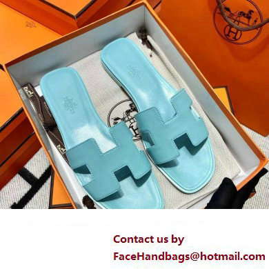 Hermes Oran Flat slippers in swift leather bleu cameo