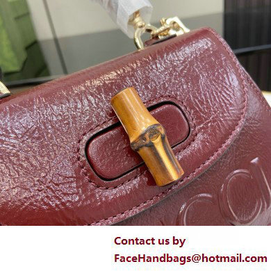 Gucci Bamboo 1947 mini top handle bag with Debossed Gucci logo 786482 burgundy 2025