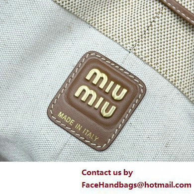 MIU MIU Canvas and leather bucket bag 5BE089 2025