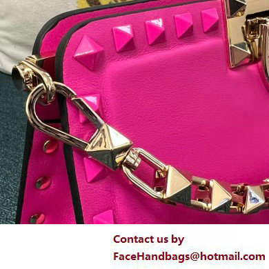 Valentino Rockstud Clutch Bag In Calfskin Fuchsia 2025