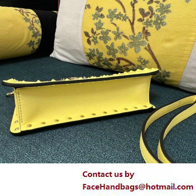 Valentino Rockstud Clutch Bag In Calfskin Yellow 2025