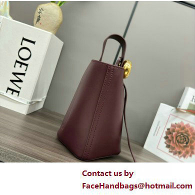 loewe mini Pebble Bucket bag in mellow calfskin dark burgundy 2025