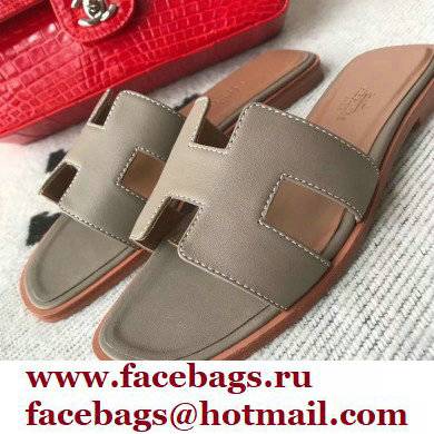 Hermes Oran Flat Sandals in Swift Box Calfskin 75